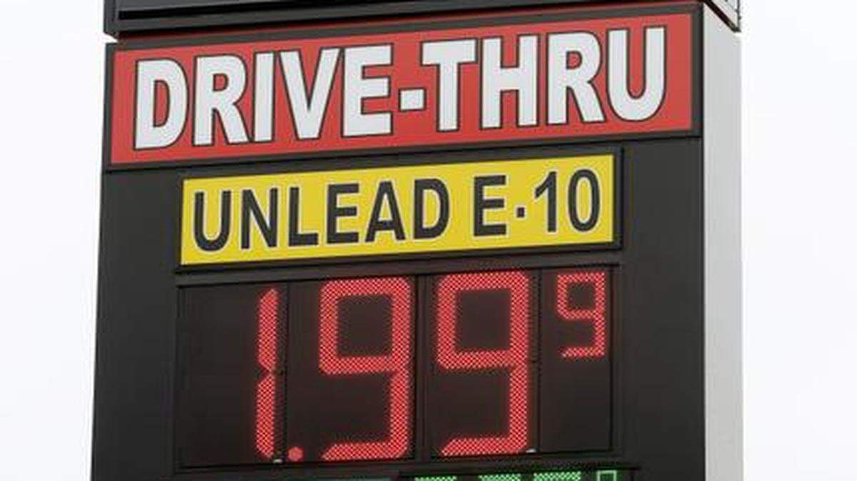 
A sign displays the price for E-10 gasoline for $1.99 at the OnCue convenience store and gas station in Oklahoma City. 

