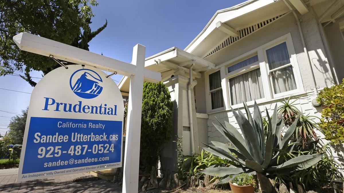 One week after the Federal Reserve raised short-term interest rates from record lows, the average on a 30-year fixed-rate mortgage went the other way: It dipped to 3.96 percent from 3.97 percent last week, mortgage giant Freddie Mac said,