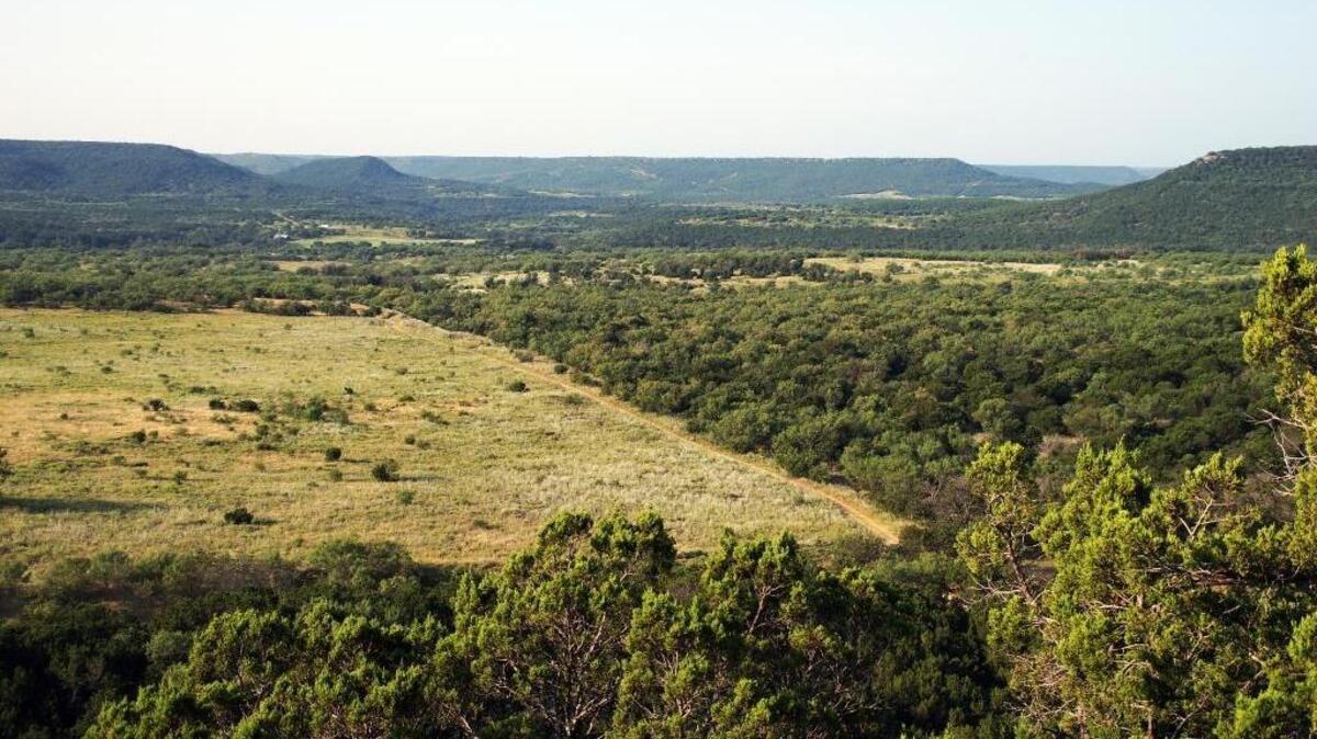 Walton’s Fortune Bend property offers spectacular views of the landscape. The 4,416-acre ranch is near Possum Kingdom Lake.