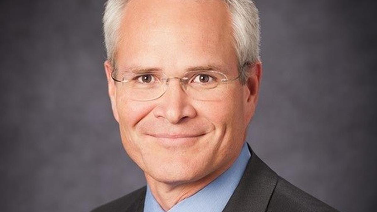 Darren Woods will become president of Exxon Mobil on Jan. 1.
