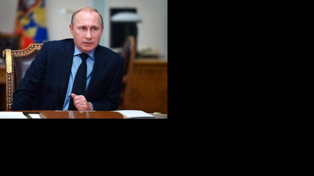 
Russian President Vladimir Putin speaks during a cabinet meeting at the Novo-Ogaryovo residence outside Moscow, Jan. 26. The meeting focused on the governments anti-crisis plan. 
