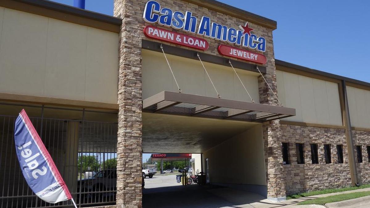 Cash America will continue to operates pawn shops under its name, like this one on Camp Bowie Boulevard in Fort Worth, after its merger with First Cash.