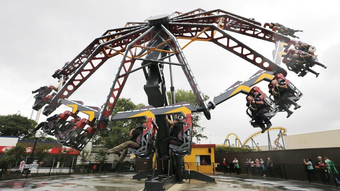Six Flags Over Texas and Six Flags Hurricane Harbor announced Wednesday that it raised wages for about 90 percent of its workers.
