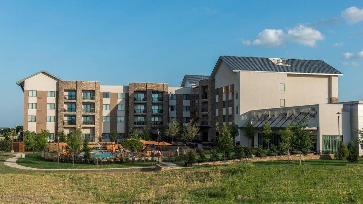 The pool area at the Courtyard Fort Worth at Alliance Town Center backs up to Bluestem Park.