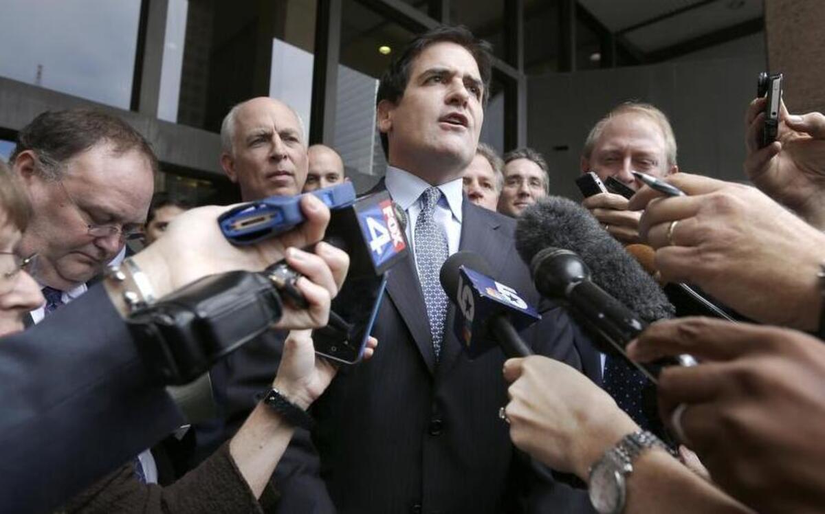 
Dallas Mavericks owner Mark Cuban talks to reporters in 2013 after a jury in federal court found that the SEC failed to prove several key elements of its case, including that Cuban traded on nonpublic information.
