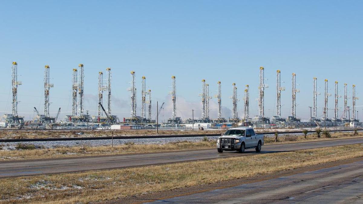 More than 30 oil drilling rigs sat idle in a Helmerich & Payne yard in Odessa last February as drilling activity declined.