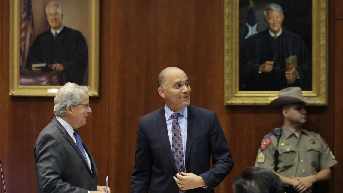 
Wallace Jefferson, center, representing Fort Bend Independent School District, arrives to make oral arguments at Texas' latest school finance trial at the state Supreme Court, Tuesday, Sept. 1, 2015, in Austin, Texas. Jefferson was back in court Wednesday for arguments in a Tarrant County indigent court fees case. (AP Photo/Eric Gay)
