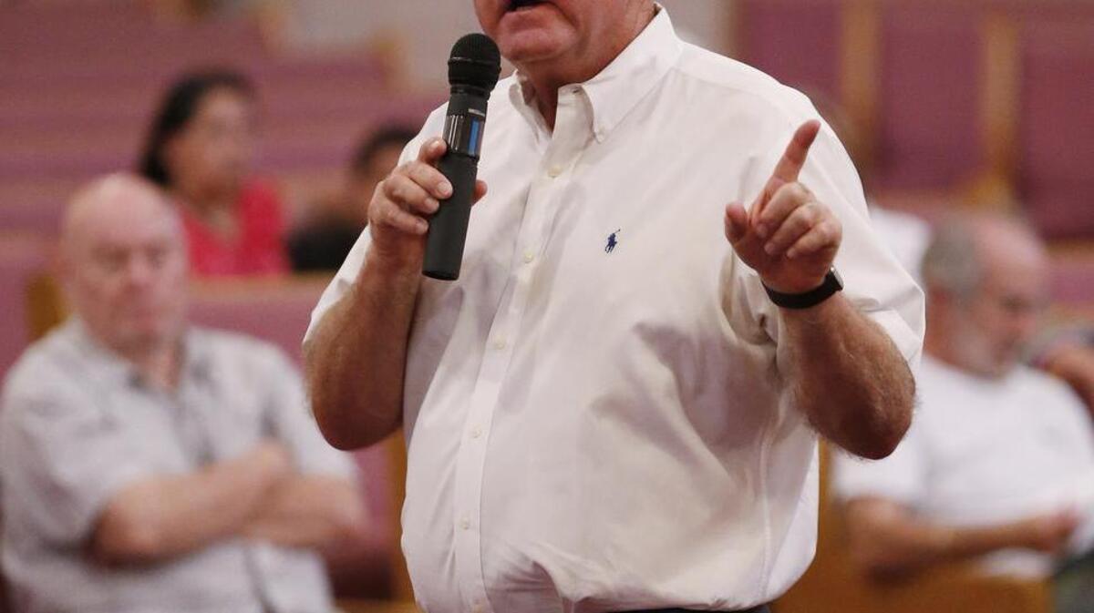 Dan McDonald speaks at a church in 2014 about his mass tort lawsuit against Chesapeake Energy.