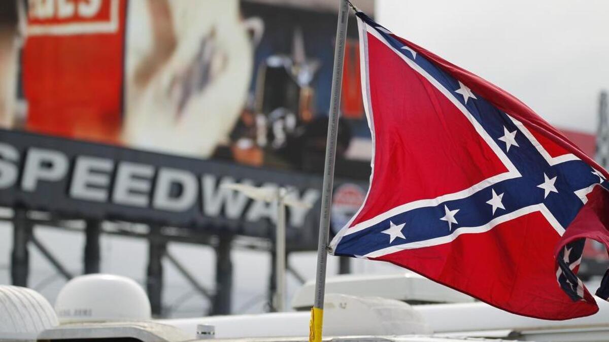 A handful of Confederate battle flags flew in the infield of Texas Motor Speedway before the NASCAR Xfinity Series O’Reilly Auto Parts Challenge in 2015.