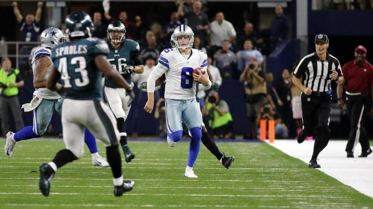 Dallas Cowboys punter Chris Jones (6) runs the ball on a successful fake punt play in the second half.