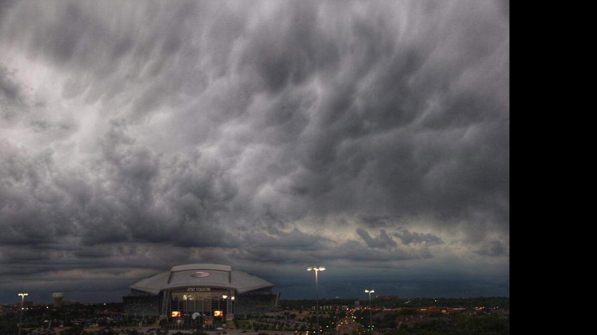 
The storm front moves into Arlington over AT&T Stadium on Saturday night. 
