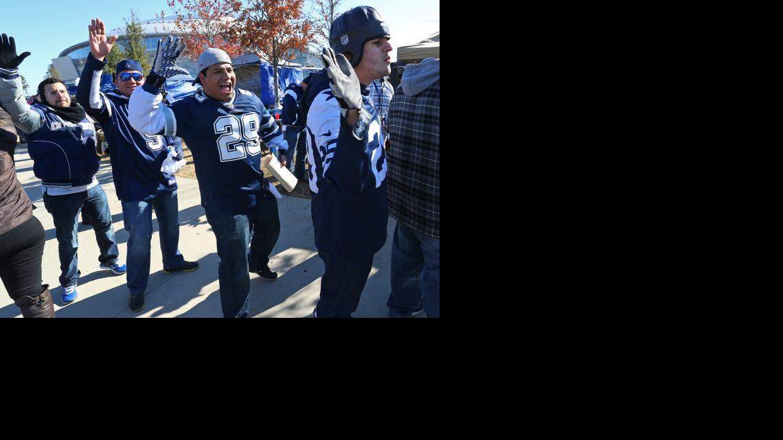 
The sidewalk along Randol Mill for Ramon Reyes (#29), and Henry Barrera, in hat. was loud and Cowboys-proud as fans walked to the game.

