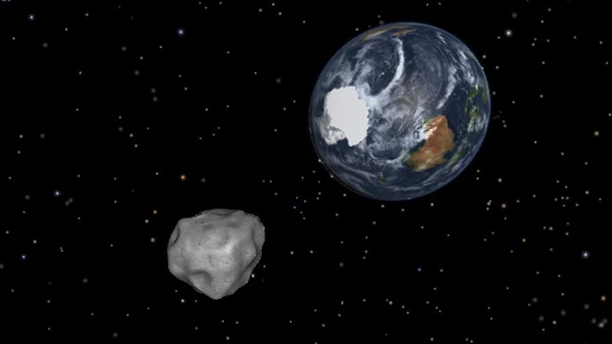 This image provided by NASA/JPL-Caltech shows a simulation of asteroid 2012 DA14 approaching from the south as it passes through the Earth-moon system on Feb. 15, 2013. The 150-foot object passed within 17,200 miles of the Earth.