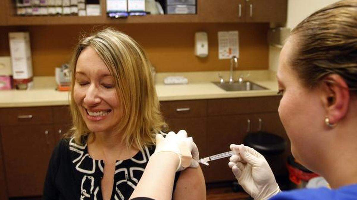 A file photo of a patient getting a flu shot at CareNow in north Fort Worth.