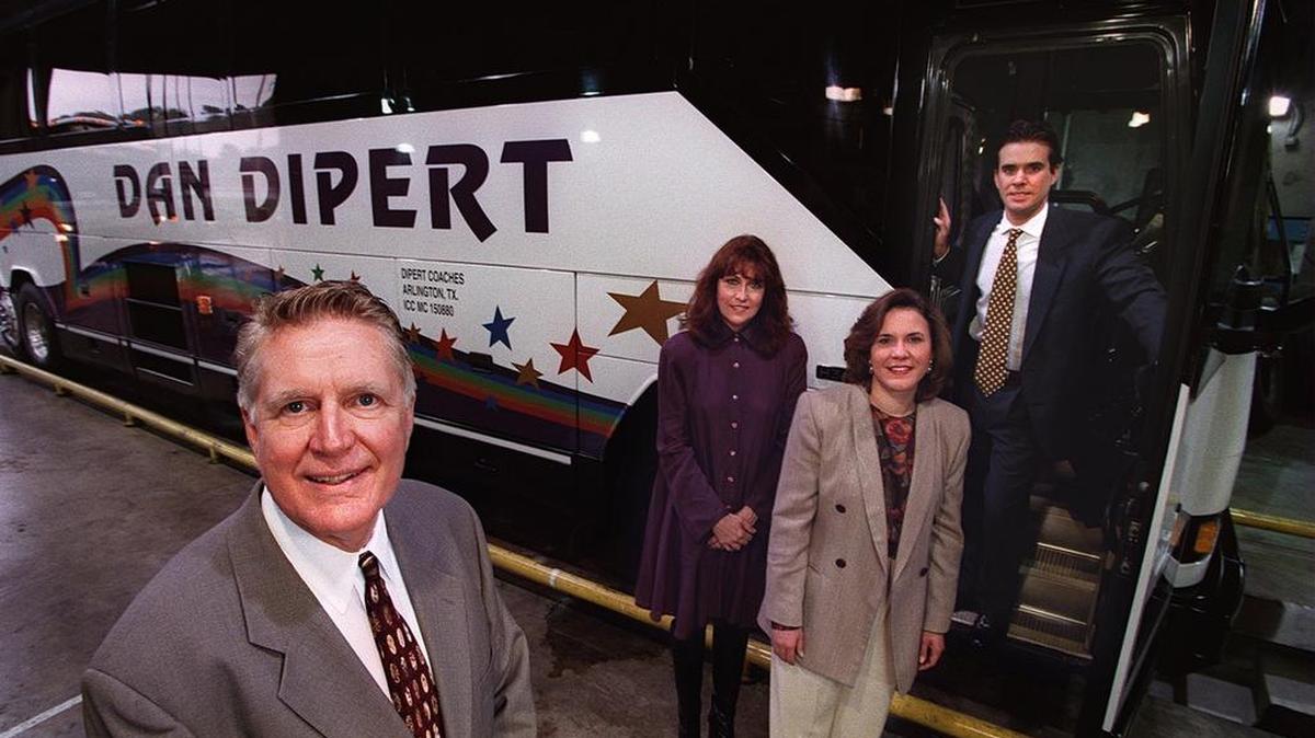 Dan Dipert’s Travel Service was named in a lawsuit after a man who cleans buses was crush between two vehicles. Dan Dipert, left, poses with his wife Linda, rear left, in this 2004 photo.
