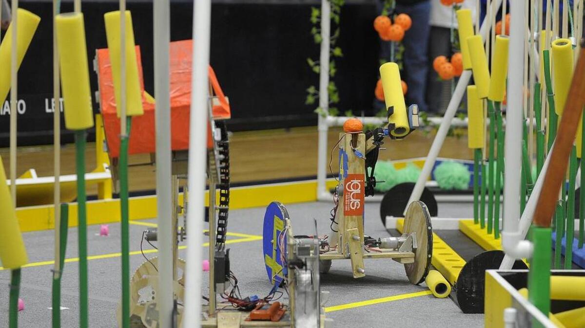 Robots compete during the semi finials at the Boosting Engineering Science and Technology - BEST - Robotics tournament at Lamar High School.