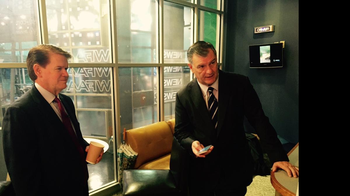 
Arlington Mayor-elect Jeff Williams, left, and Dallas Mayor Mike Rawlings off-stage Sunday morning at WFAA’s Victory Park studio. They had never met before taping WFAA’s Inside Texas Politics.
