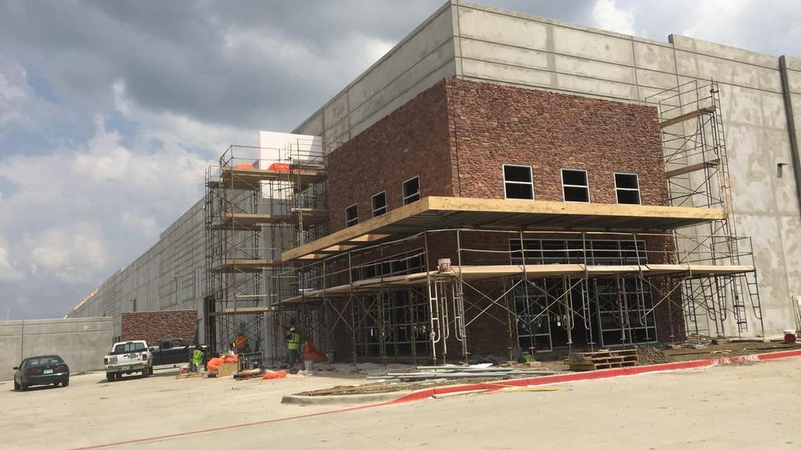 A pair of 420,000-square-foot industrial buildings are going up at the former site of National Semiconductor in south Arlington, and a third building is planned.