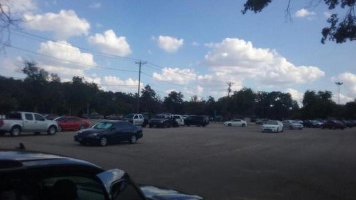 
Arlington police at UT Arlington Lot 50 after armed robbery. 
