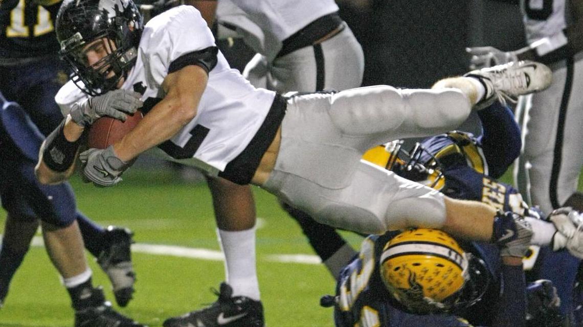 Joe Lavilla dives toward the endzone during a 2008 game for Arlington Martin.