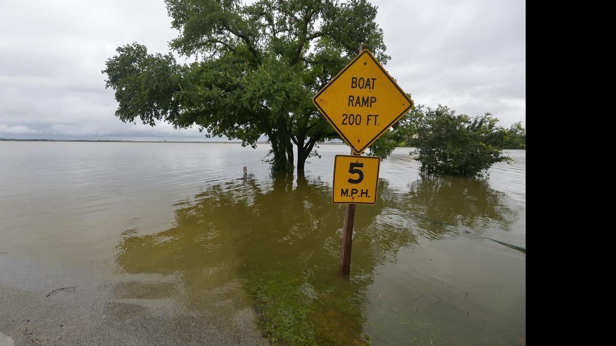 
Katie's Woods Park is shown underwater in this file photo. Grapevine Lake is still 25 feet above normal, meaning city officials may have to wait months to assess the damage to its parks and roads around the lake.
