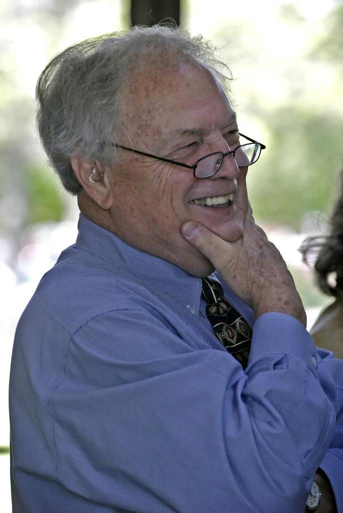 Rush Creek Christian Church Pastor Dick Lord talks with church members before the start of services on Easter Sunday, April 16, 2006. He would retire a few weeks later.