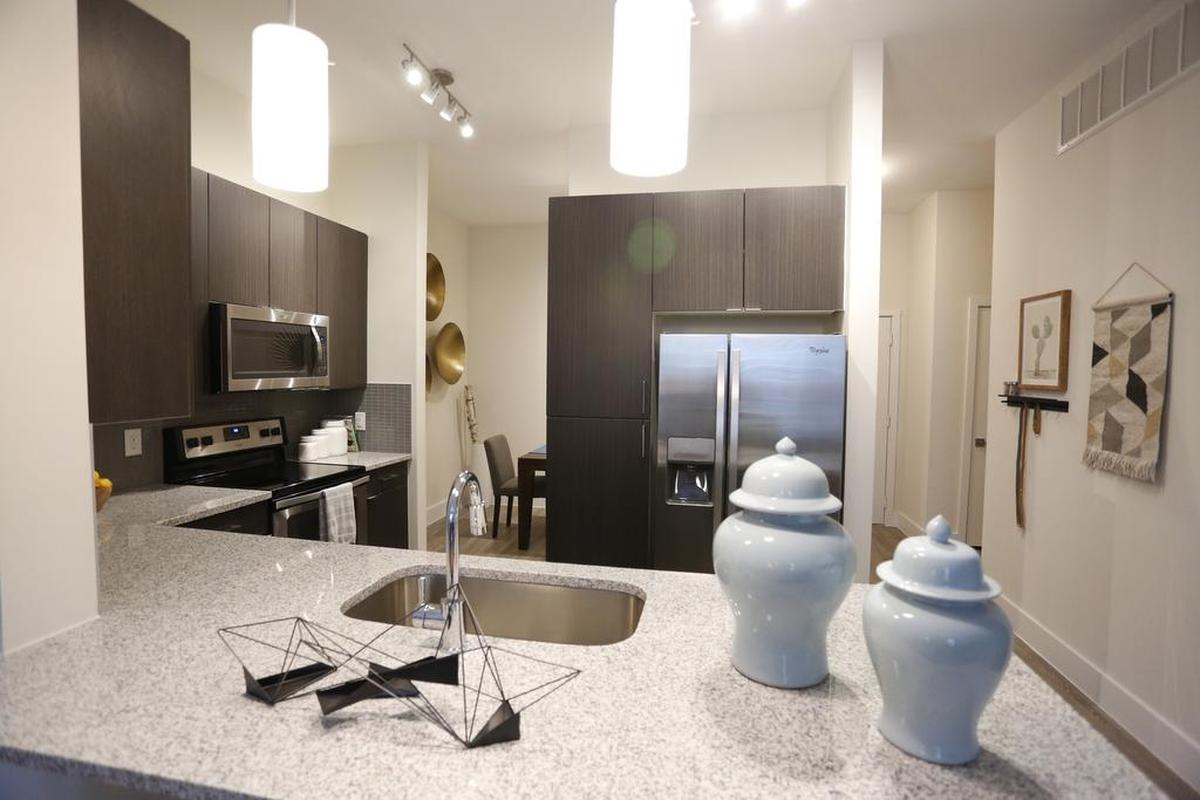 The kitchen in a larger apartment in the Arlington Commons. The high-end apartments will be opening in phases starting soon.
