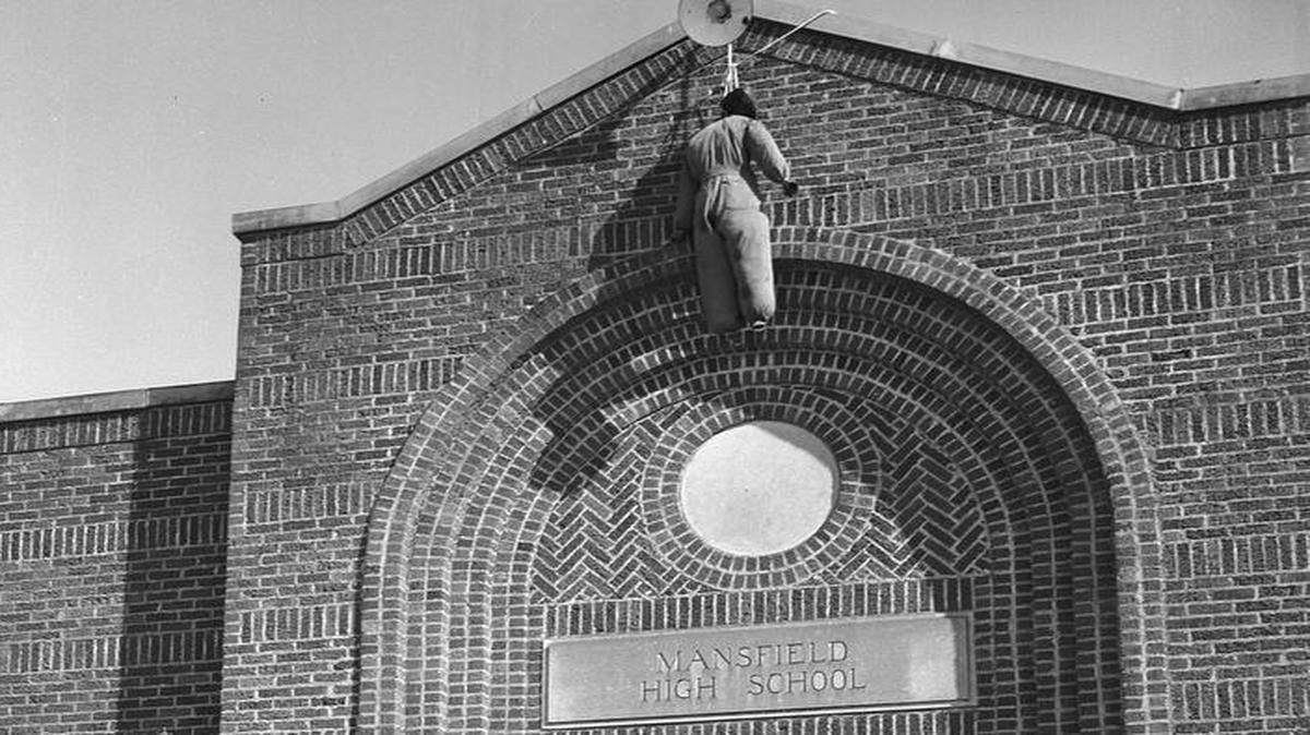 On Aug. 30, 1956, only white students entered Mansfield High School with an effigy hanging over the door. Black students who had attempted to enroll were turned away.