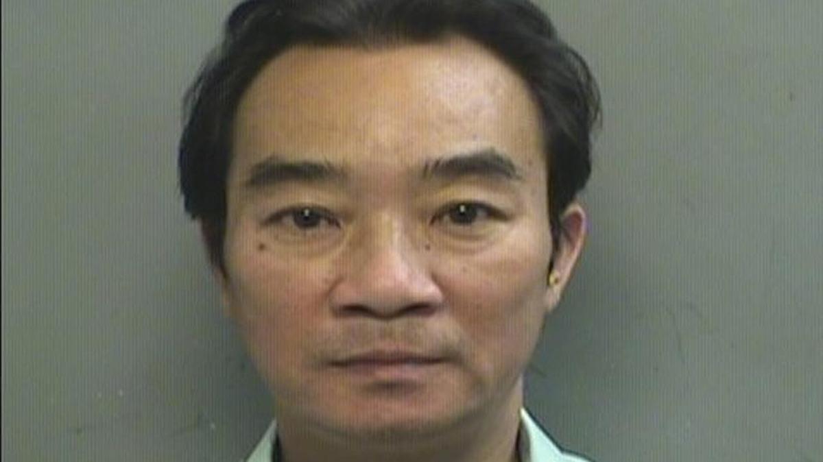 Kennedy Cox Pham, 47, surrendered to authorities Thursday.