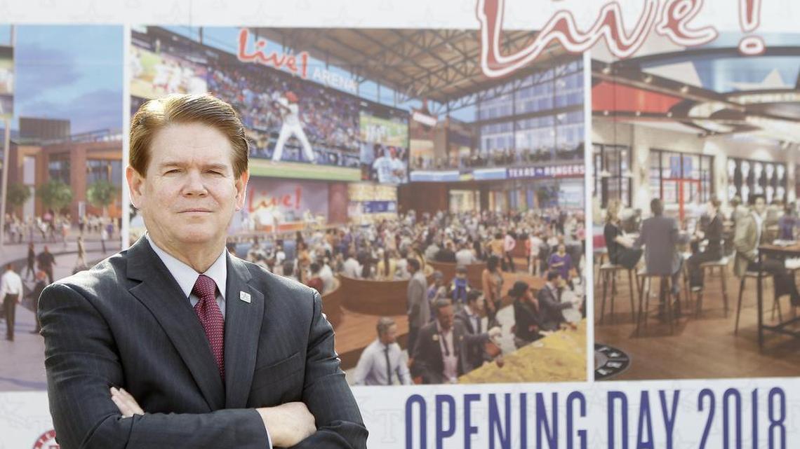 Arlington mayor Jeff Williams stands in front of a poster marking the construction site for Texas Live!, a $250 million entertainment and high-rise hotel complex that will be next door to both the Texas Rangers’ current and future stadiums.