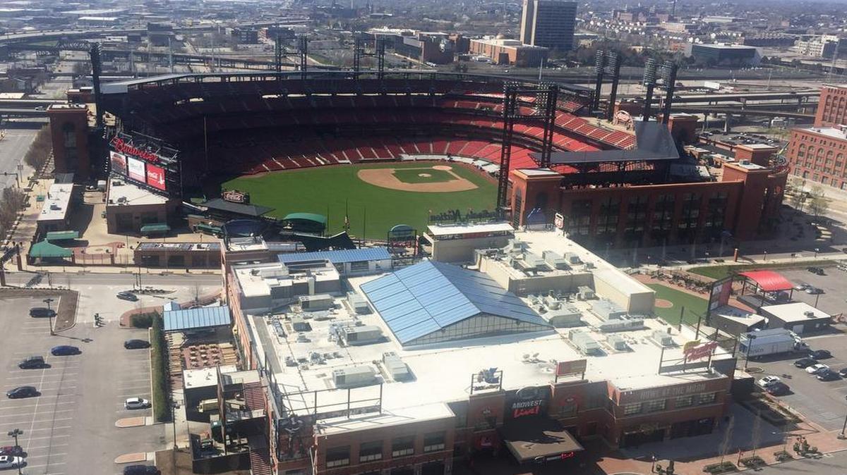 St. Louis’ Ballpark Village and Busch Stadium are prominent landmarks in a view from the 26th floor of a nearby hotel.