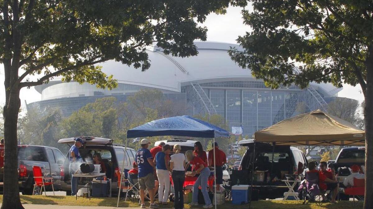 
During 2011, Rangers fans waiting for the start of a World Series game did some tailgating while the Cowboys played at AT&T Stadium. Fans are encouraged to do the same on Sunday to avoid traffic issues.

