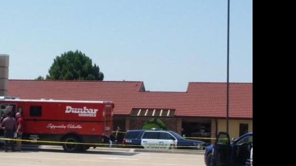 
A man who attempted a holdup at a Bank of America in Arlington was shot by an armored truck guard.
