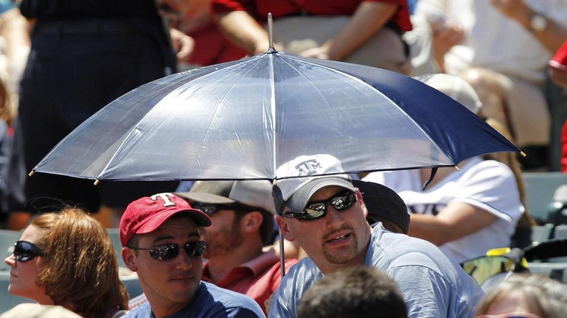 Umbrellas can help, but afternoon games at Ranger games in the summer are hot, hot, hot.