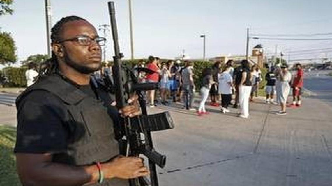 LaShadion Anthony Shemwell, a member of a gun club, showed up on June 10, to walk with the marchers to "protect black people".