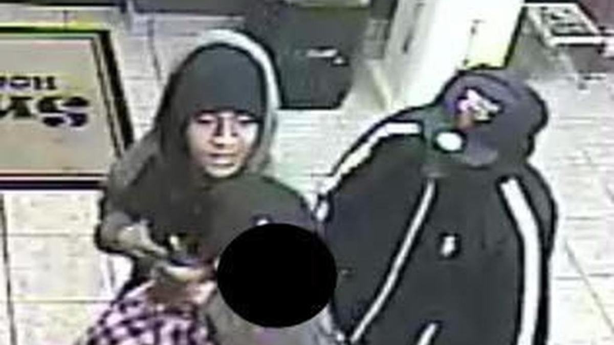 Surveillance footage at Smokies House of Pipes during an armed robbery Dec. 7, 2015 in the 5700 block of SW Green Oaks Blvd. in Arlington.