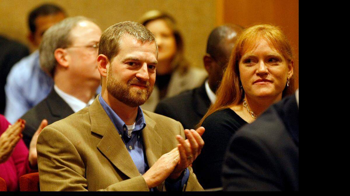 
Dr. Kent Brantly and his wife Amber Brantly attend the Tarrant County Commissioners Court where he received a proclamation in Fort Worth on Tuesday, December 9, 2015. Brantly is expected to speak at an event hosted by the Liberian Community Association of Dallas-Fort Worth. (Star-Telegram/Khampha Bouaphanh)
