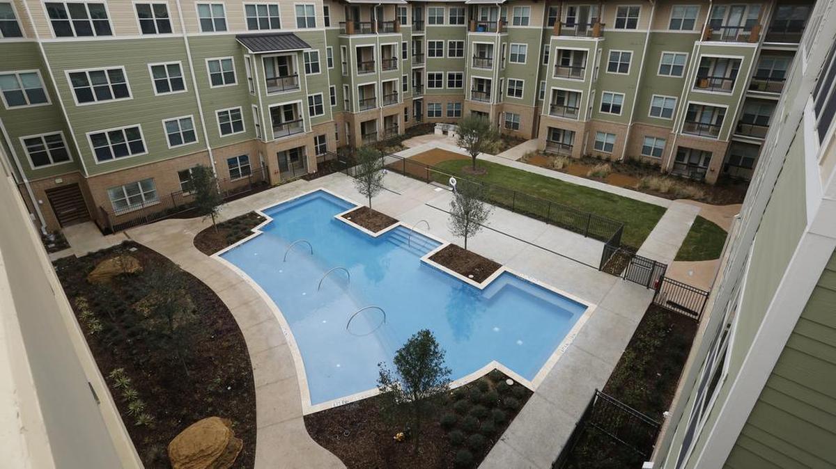 A look at the courtyard and pool area inside the Arlington Commons apartment complex at 425 E. Lamar Blvd.