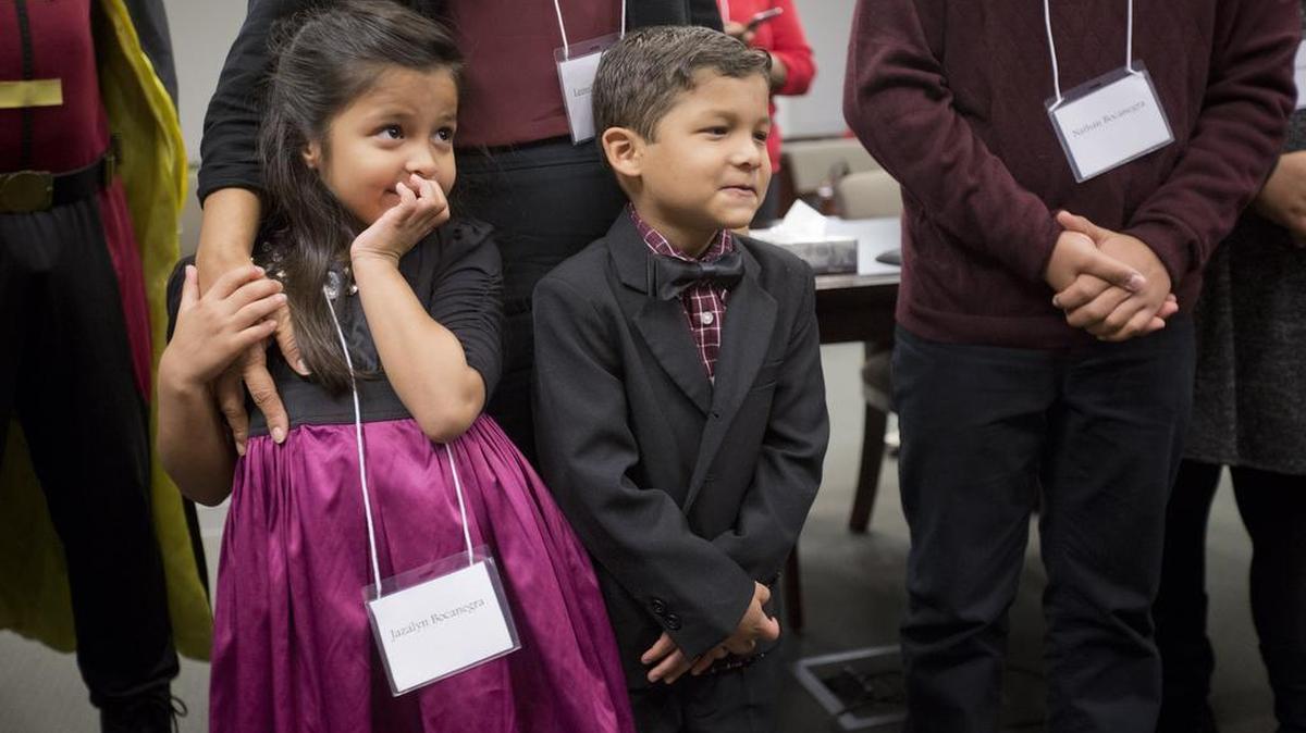 Jazalyn and Juan Bocanegra were adopted by Leonila and Jorge Bocanegra Friday at the Tarrant County Family Law Center as part of National Adoption Day.