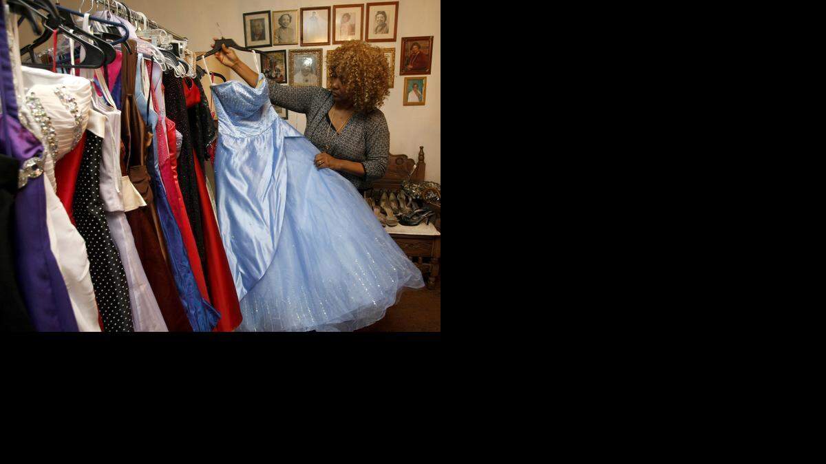 
Sandra Russell sorts dresses in preparation for the Fort Worth Association of Federated Women's Clubs prom dress giveaway in Fort Worth. 
