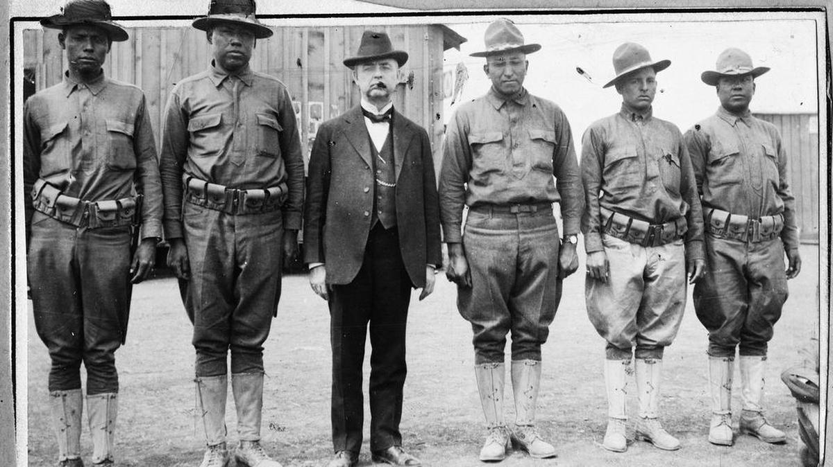 Cato Sells, U.S. commissioner for Indian affairs, is shown at Camp Bowie with some of the 600 Native Americans stationed at the military camp in Fort Worth in 1918.
