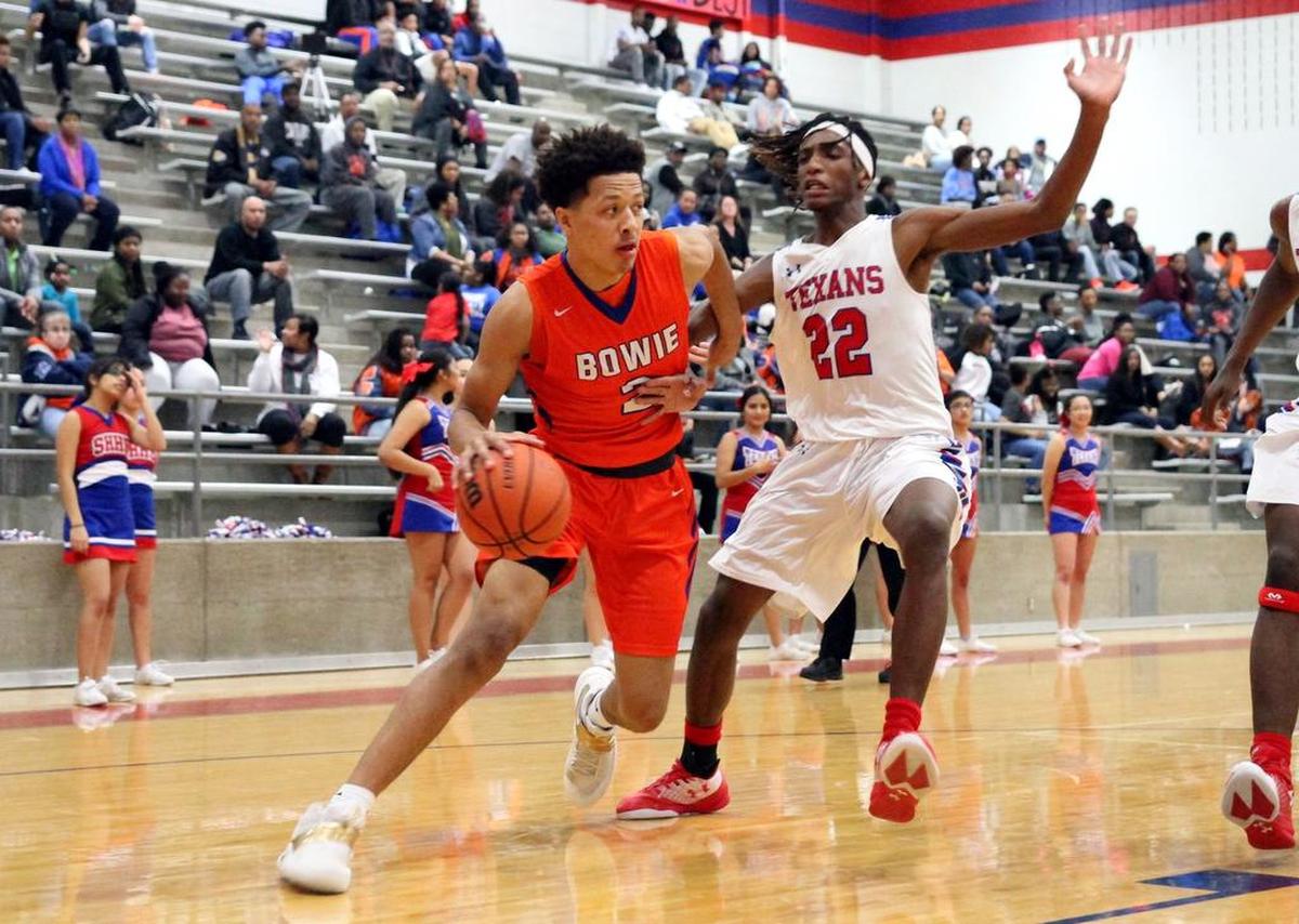 Cade Cunningham drives around a Sam Houston defender in Friday’s victory.