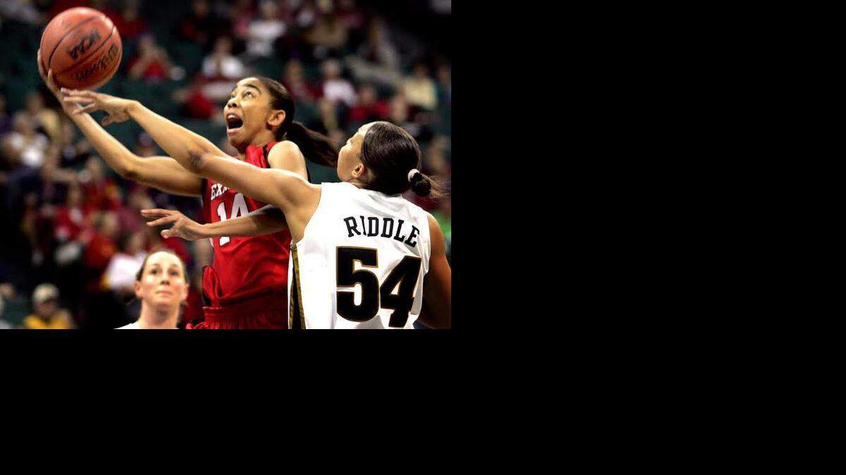
Mansfield High graduate Erin Grant (left) led her high school basketball team to four straight state titles, played at Texas Tech, and now coaches at the University of Memphis.
