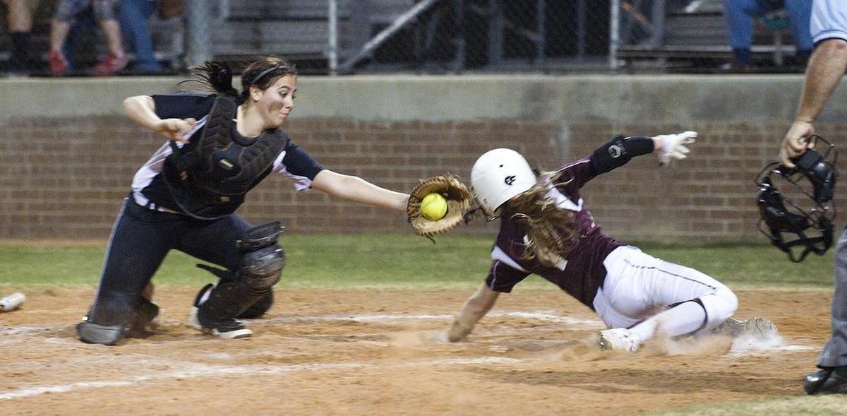 Mansfield’s Morgan Rios, left, has caught for varsity all four years of high school.