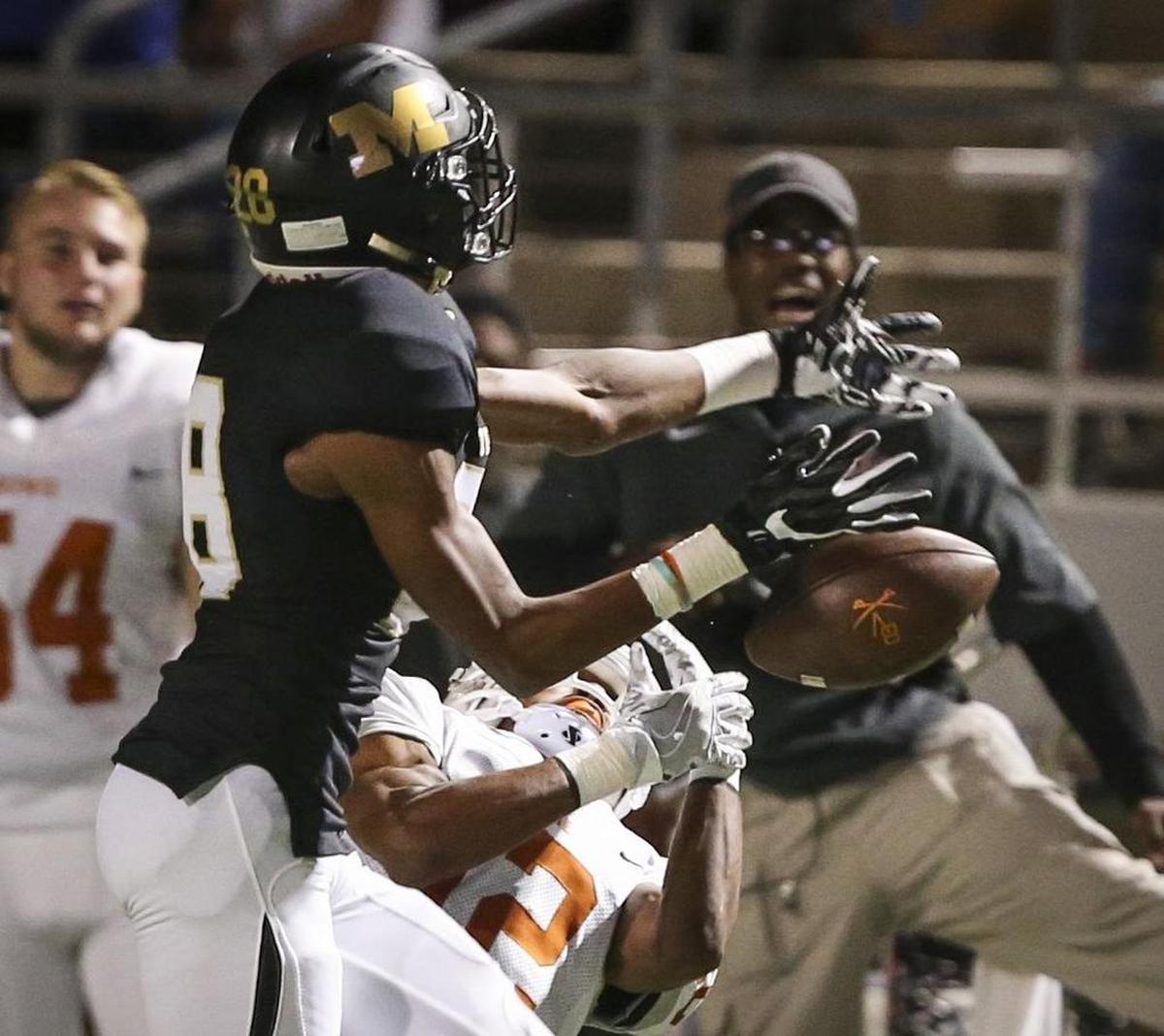 Miles Williams breaks up a pass last season. He’s the only Tigers returner to have won a district honor last season.