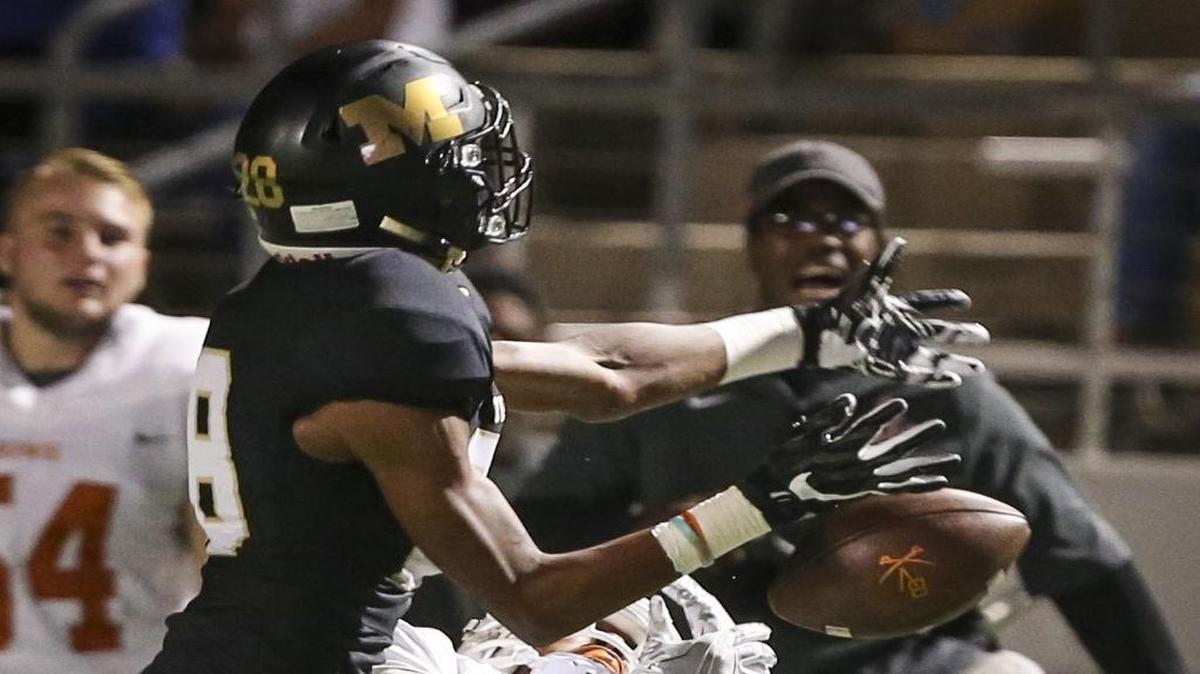 Miles Williams breaks up a pass last season. He’s the only Tigers returner to have won a district honor last season.