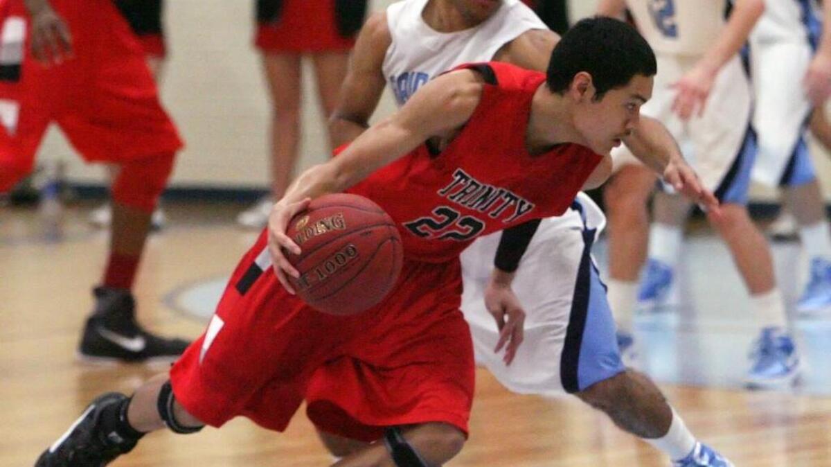 Trinity graduate Adrian Wong, shown playing in his freshman year, is now playing at Ateneo Univeristy in the Phillipines.