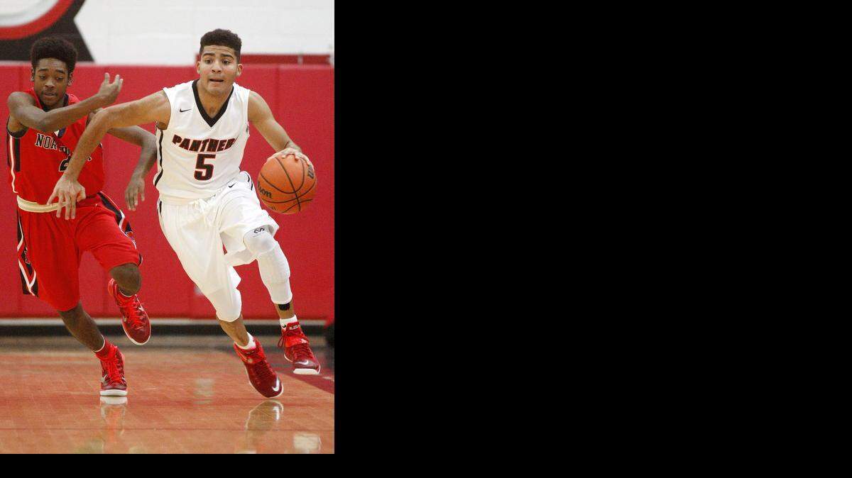 
Colleyville Heritage's Trestan Steele breaks away from the Nortwest defense in an early non-district game. 
