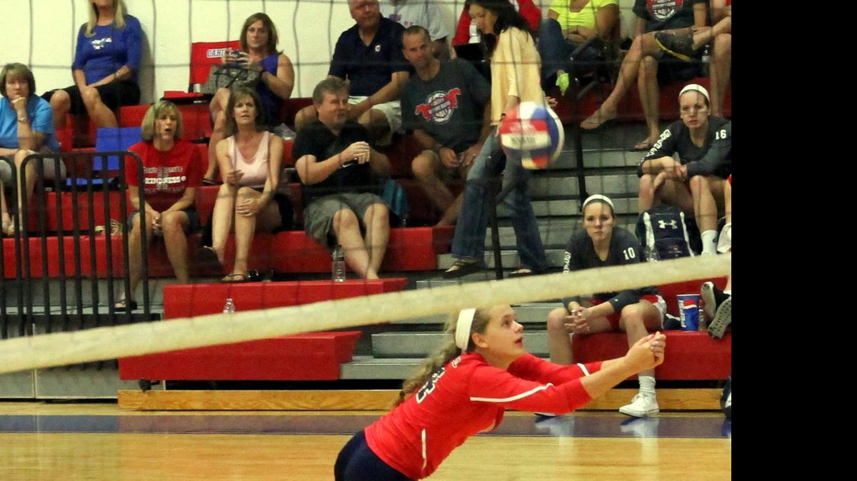 
Payton Gidney digs for Grapevine in district play last season.
