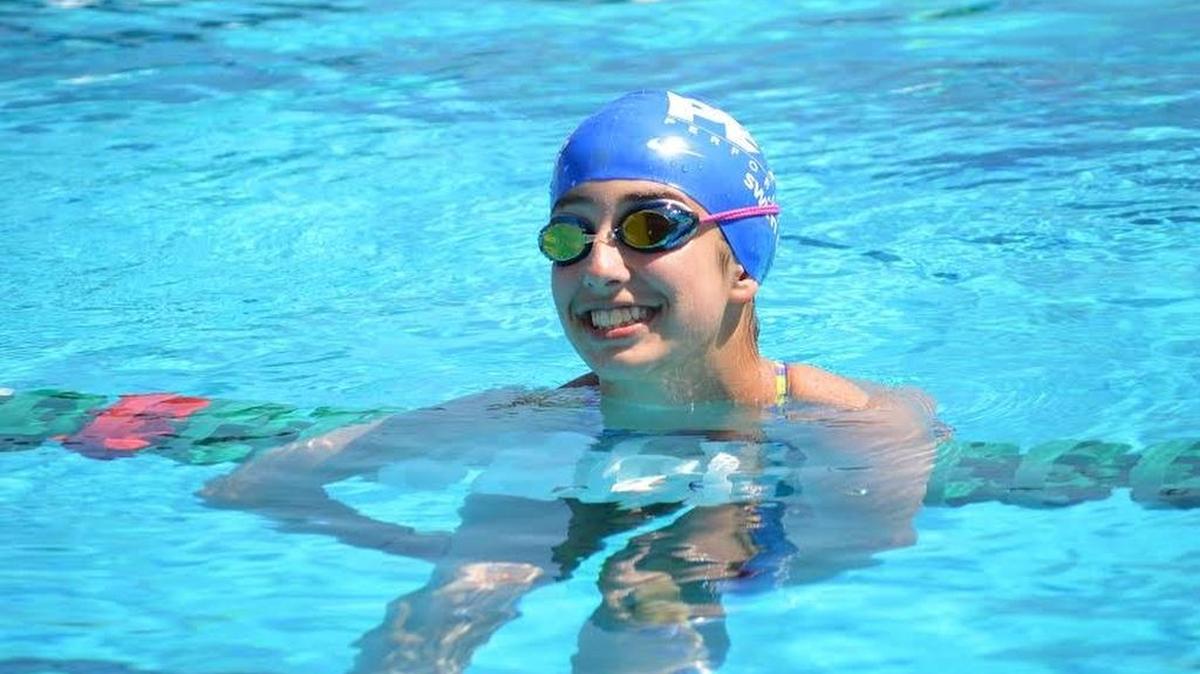 Elise Cerami, 13, at a swim meet. Cerami died in a drowning accident Monday.